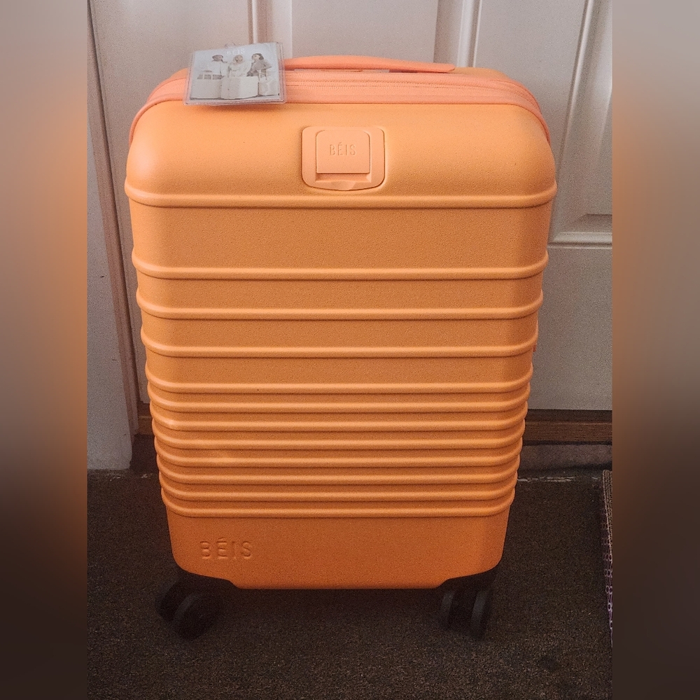 Beis creamsicle carry-on roller